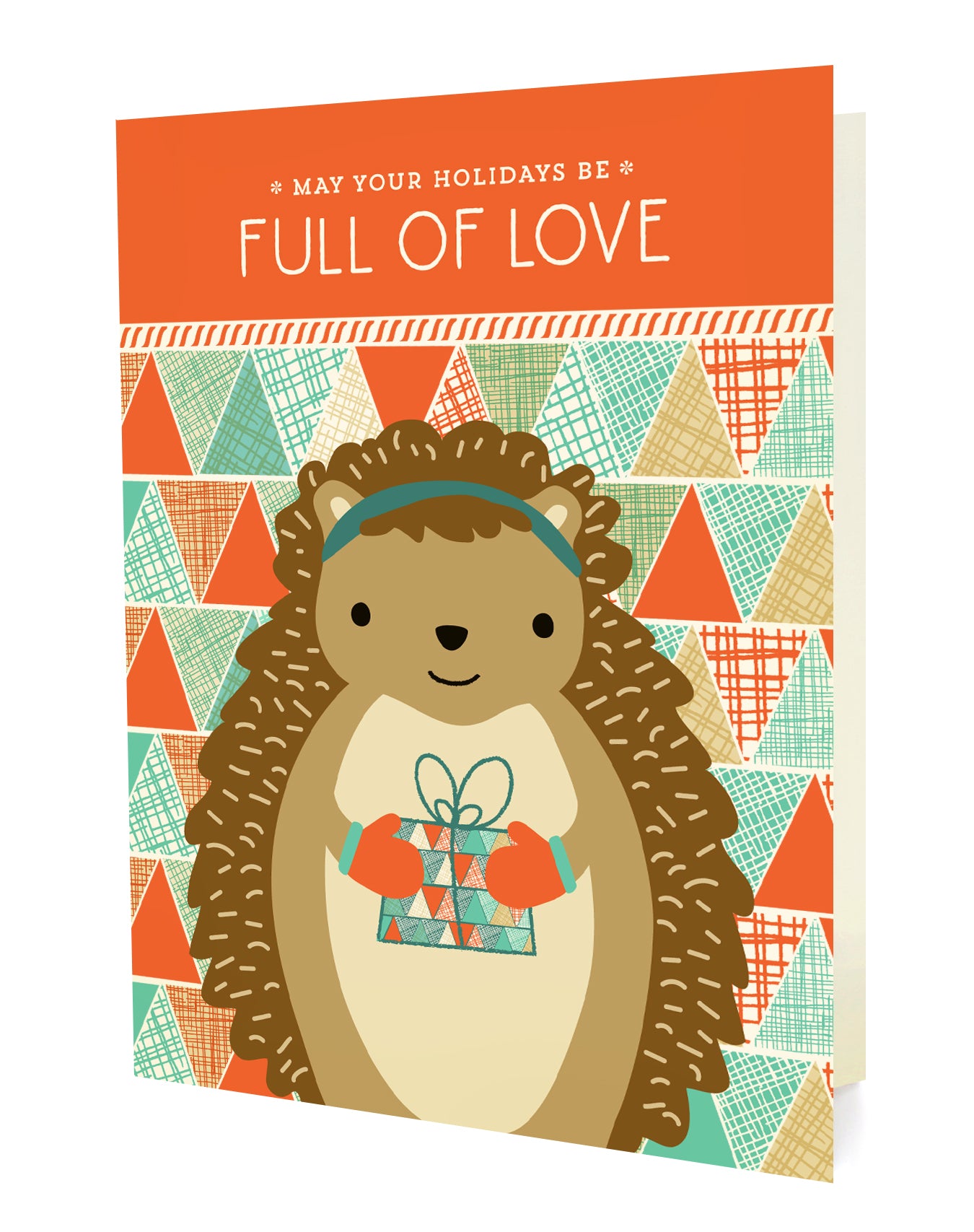 Front of a folded holiday card with a cute, gift-bearing hedgehog on a geometric patterned background with "May your holidays be full of love" text.