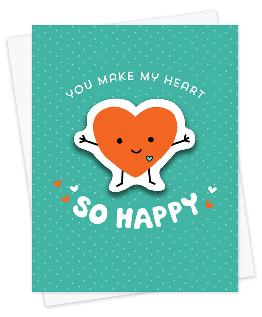 Happy Heart sticker card with removable red happy heart vinyl sticker and "You Make My Heart So Happy" text against an aqua background with small, faint polka dots. Shown with a white envelope.
