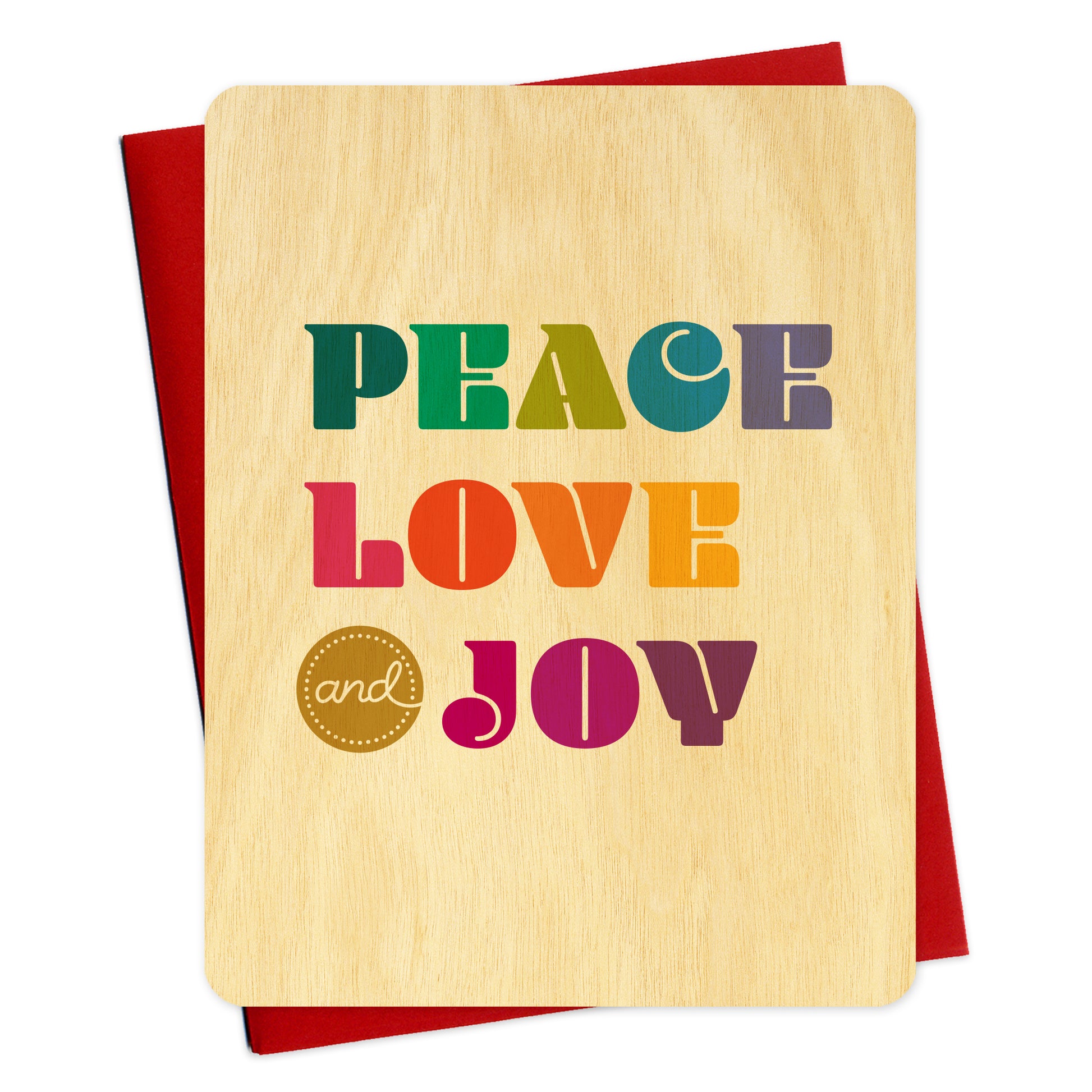 Flat birch wood holiday card featuring colorful, bold “PEACE LOVE & JOY” lettering in shades of green, teal, purple, pink, red and orange. Shown with a red envelope.