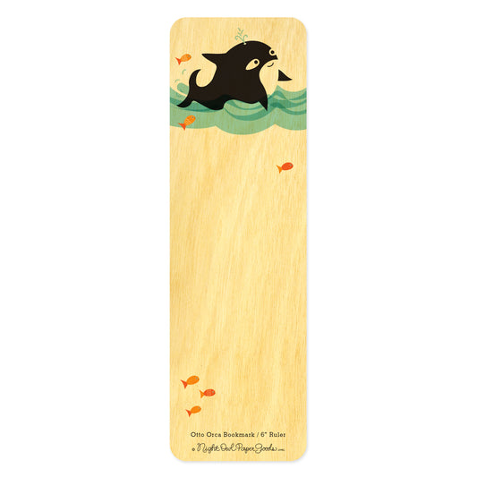 Wood bookmark with cute black orca whale in water with orange and red fish