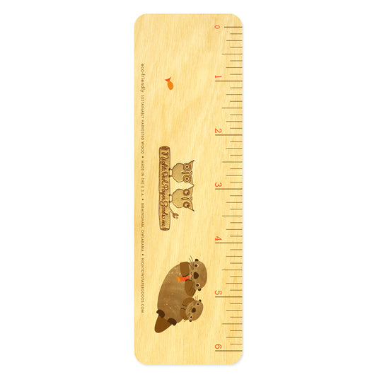 Back side of wooden otter bookmark features 6 inch ruler measurements