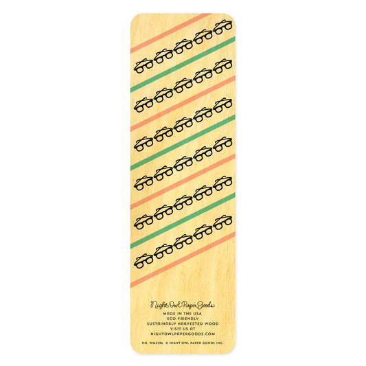 Back side of wooden bookmark with pink and aqua strips and pattern of black eyeglasses