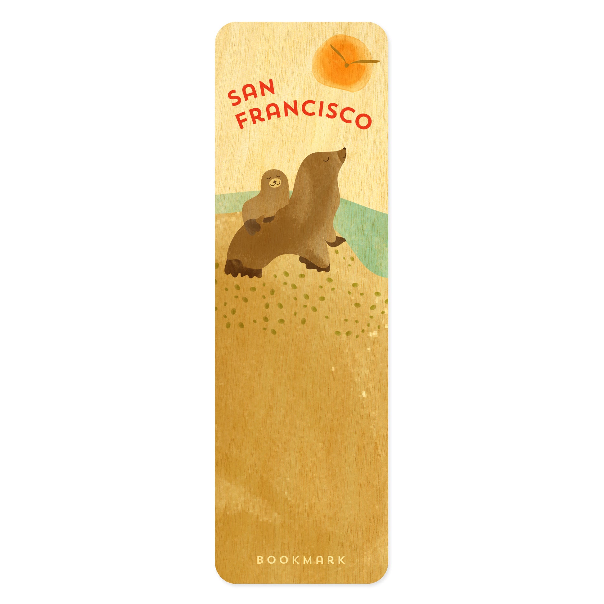 Wooden bookmark with red text that reads 'San Francisco' with cute illustration of two sea lions, sun and seagull