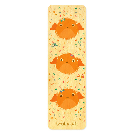 Birch wood bookmark featuring three cute orange puffer fish surrounded by colorful confetti, rainbows, hearts and stars. Text at bottom reads "bookmark."